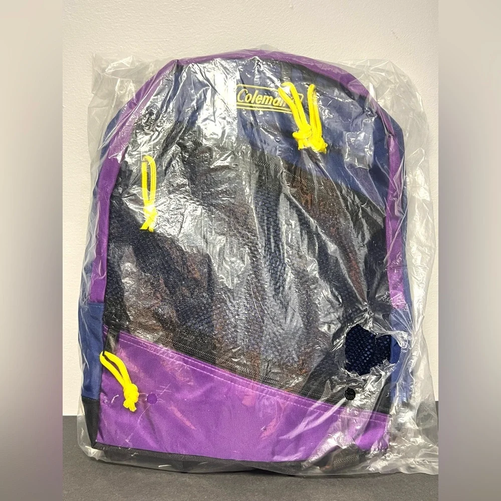 Coleman- Backpack, New in Bag, Around 15.5 inches tall,‎ Purple/Black/Yellow